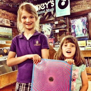 Just took the girls to @Grimeys to pick up a vinyl copy of "Turn Blue," the new album from The Black Keys. Kate was very concerned there wouldn't be any copies left. She was so surprised when she saw it that she counted all the copies in the store. There were 50....well 49 now :-)