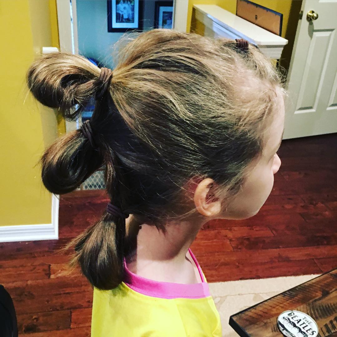 Love Sara's Rey hairdo from #StarWars #TheForceAwakens. Strong female lead = both of my daughters thinking it is the best movie ever. So fun that they are experiencing the same thing I did as a kid! #family