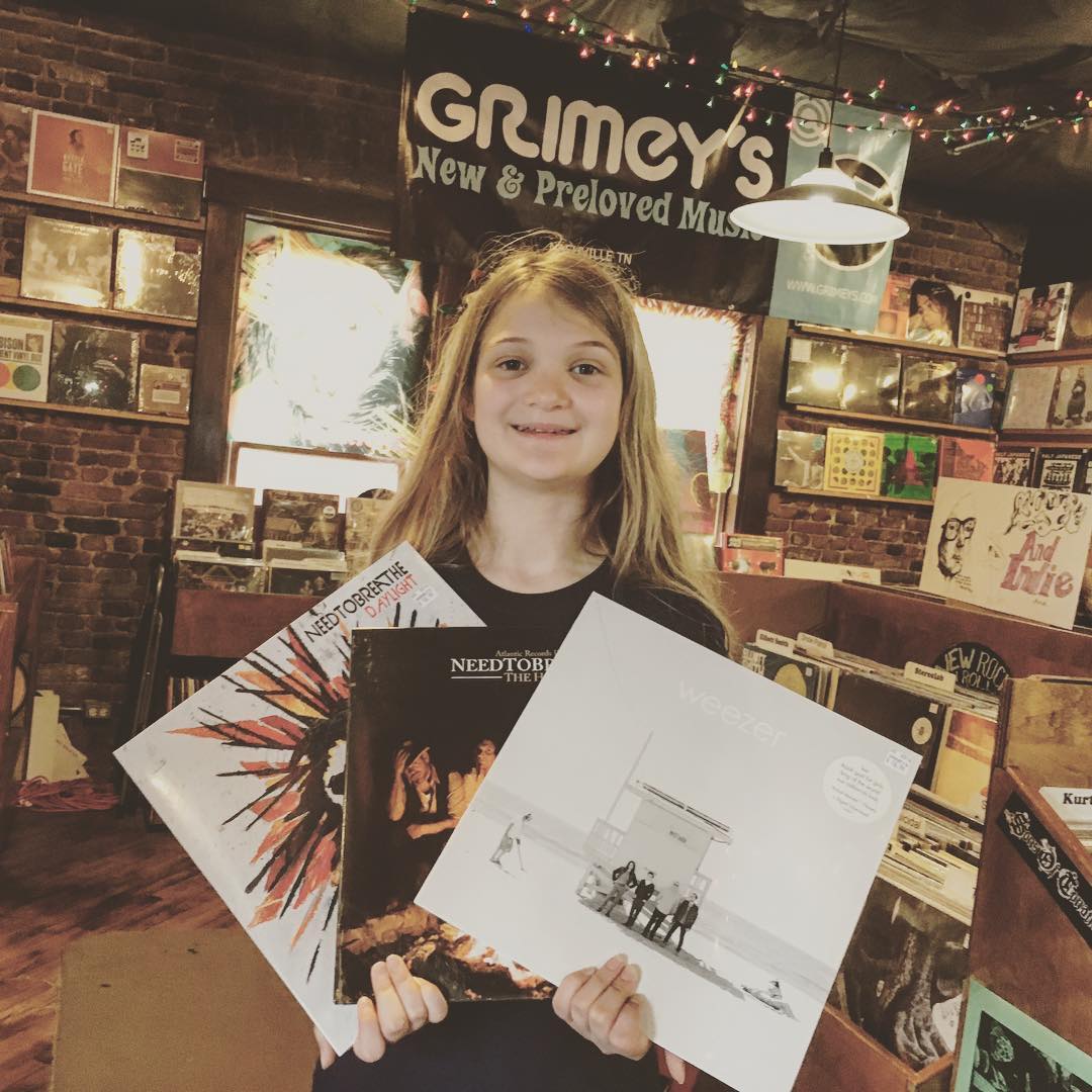 So glad to have Kate home from a 3-day, out of state field trip! After picking her up this afternoon we swung by @grimeys to pick up some fresh #vinyl from @needtobreathe and Weezer. #music #family