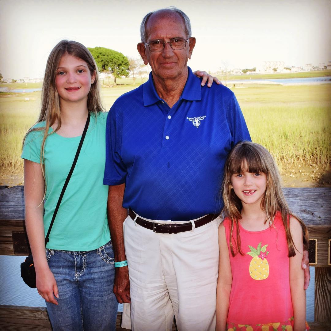 Papa with the girls last night on the Marshwalk in Murrells Inlet. #vacation #family #myrtlebeach