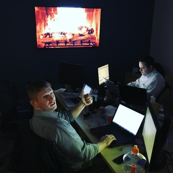 Working by the light of the fire at Formos Consulting with a little Christmas music. #itsgettinghotinhere