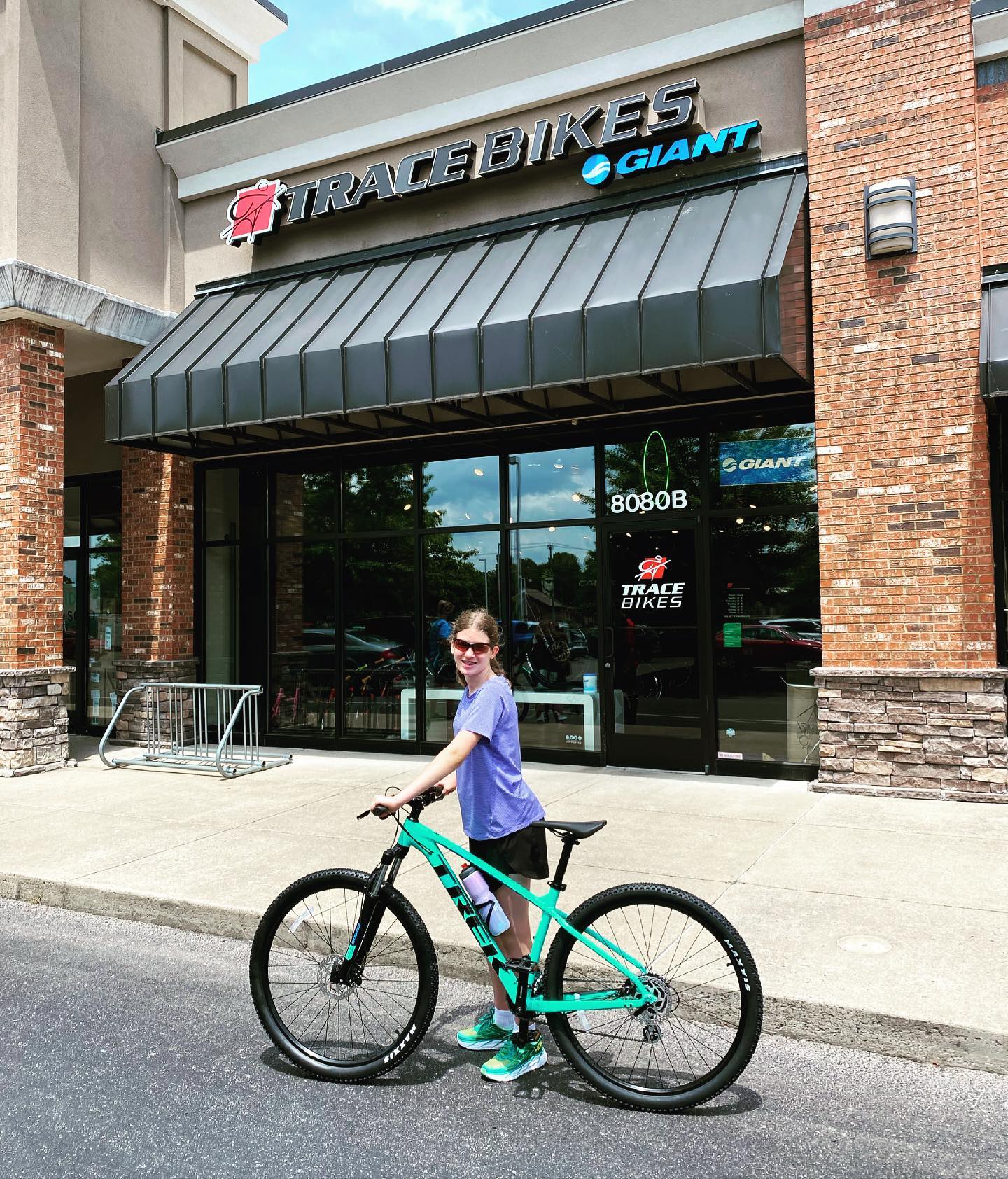 Took a long while to come in, but Sara finally got her full size bike today. About to take it out for a spin. #family #biking