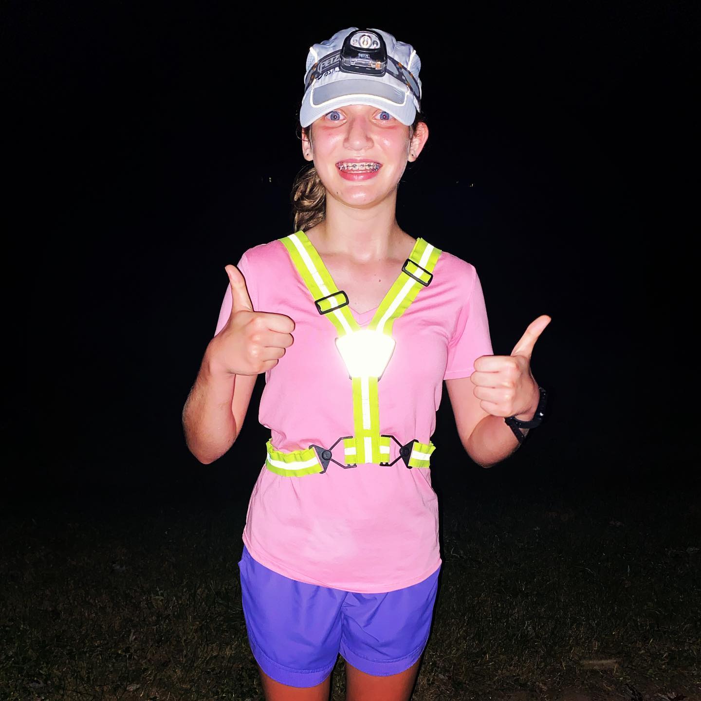 So what do you do when your training plan calls for a 30 minute run but your schedule is packed from morning until night? You slap on a headlamp and a reflective vest at 8:30pm and you get it done! This girl is working hard! #family #running