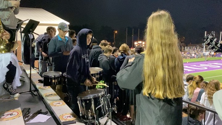 Tonight Kate (@kateagee) conducted the Lipscomb Academy Pep Band with her wizard wand while wearing her Hufflepuff Hogwarts Robes.